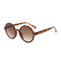 Lunettes de soleil tendance pour femmes Twooo T1135 en gros, monture ronde ondulée mignonne pour filles, 2024