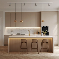 Meuble de cuisine en bois massif CBMmart, finition noyer, aménagement ouvert avec table à manger, îlot de cuisine laqué blanc avec évier