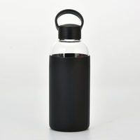 Bouteille d'eau en verre transparente personnalisée de 600 ml avec manchon en silicone pour le sport – Vente en gros