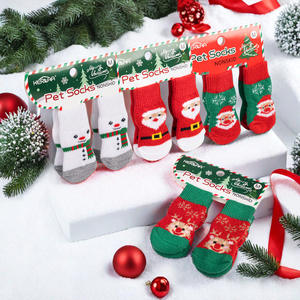 Christmas-themed pet socks for dogs with non-slip <b>PVC</b> <b>glue</b> dots, elastic band, and indoor base, featuring a festive style - Product Image 1