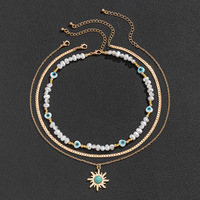 Collier vintage bohème à trois couches avec pendentif soleil turquoise, perles œil porte-bonheur, bijoux empilables pour cadeau