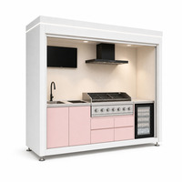Station de cuisson extérieure moderne et fermée, version Max, avec couvercle électrique rabattable, pour 6 personnes et plus, idéale pour les rassemblements.