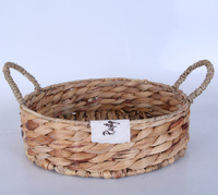 Plateau de rangement rond peu profond en jacinthe d'eau naturelle fait main avec poignées pour fruits, pain, cuisine, table, organisateur de maison