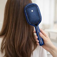Peigne anti-chute de cheveux avec distributeur de sérum et applicateur d'huile, outil de soin du cuir chevelu, peigne de massage à coussin d'air pour la croissance des cheveux