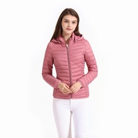 Doudoune à fermeture éclair courte pour femmes personnalisée en gros ODM/OEM style col montant de couleur unie avec capuche amovible