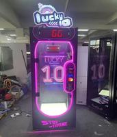 Machine d'arcade à monnayeur pour jeu de ciseaux 'Lucky 10 Second' avec défi ludique et grand prix en forme de poupée