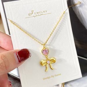 Collar Gargantilla Chapado en Oro de 18K para Mujer, con Circonitas Brillantes, Colgante de Corazón y Lazo Delicado - Product Image 2