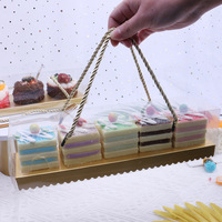 Boîte d'emballage de rouleau à gâteau portable transparent en plastique personnalisé Boîte de cuisson de rouleau suisse de mousse de jaune d'oeuf pour dessert