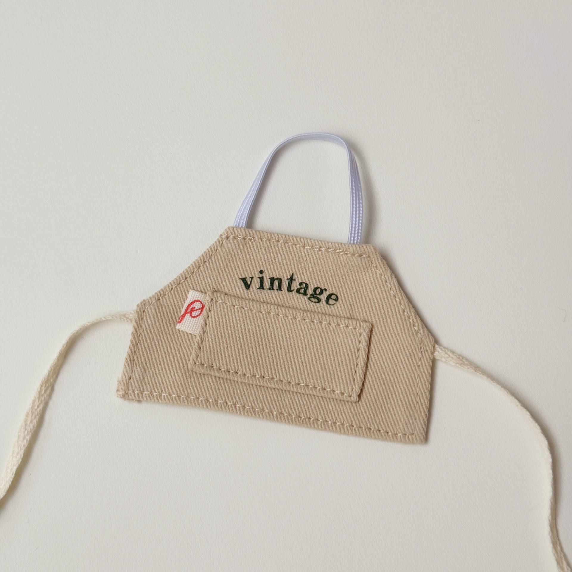 Artist's apron (apricot) - 10-17cm universal