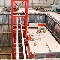 Élévateur à double cage SC200/200 pour la construction, fonctionnement à 2 mains, moteur 11-15 kW, tension 220 V/380 V, capacité 2000 kg, haute performance