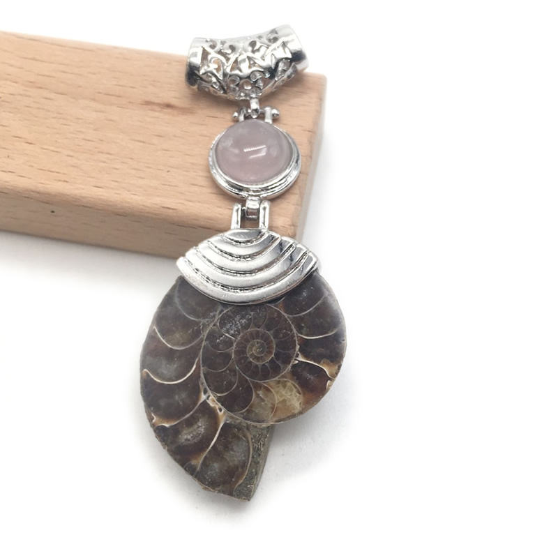 Pink crystal snail pendant