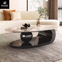 Table basse ovale de luxe en marbre de style européen et américain, avec support créatif en métal en forme de boule, pour salon moderne