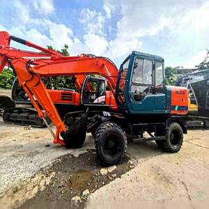รถขุดล้อยางฮิตาชิ EX100WD มือสองสภาพดี ของแท้ เหมาะสำหรับงานก่อสร้างในเมือง - Product Image 1