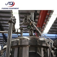 Machine de remplissage isobare automatique haute efficacité 5000 BPH pour boissons gazeuses, eau gazeuse et CSD en bouteille PET, à prix compétitif