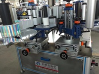 Machine d'étiquetage automatique pour bouteilles rondes, machine d'étiquetage d'orientation des bouteilles