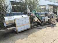 Friteuse à gaz électrique automatique pour mélanger et décharger les pois de cacahuètes Friteuse à frites et chips de pommes de terre