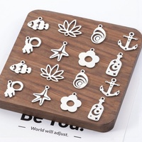 Petite breloque en acier inoxydable sur le thème de la mer fleur étoile de mer astronaute ancre conque pendentif résultats de bijoux et composants en stock