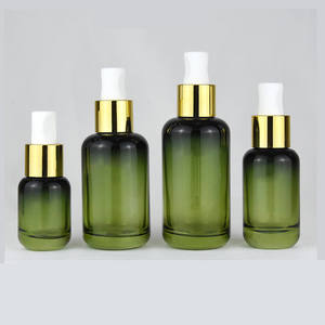 Flacon compte-gouttes à bouton-poussoir dégradé de luxe à baril rond fond épais 30ml huile essentielle 4 oz flacon compte-gouttes en verre vert 100ml - Product Image 1