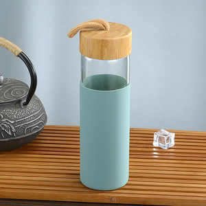 Botella de Agua Ecológica de Vidrio con Tapa de Bambú y Funda de Silicona, Taza de Viaje Portátil de Vidrio Borosilicato de Alta Calidad con Grosor de 2.8 mm - Product Image 3