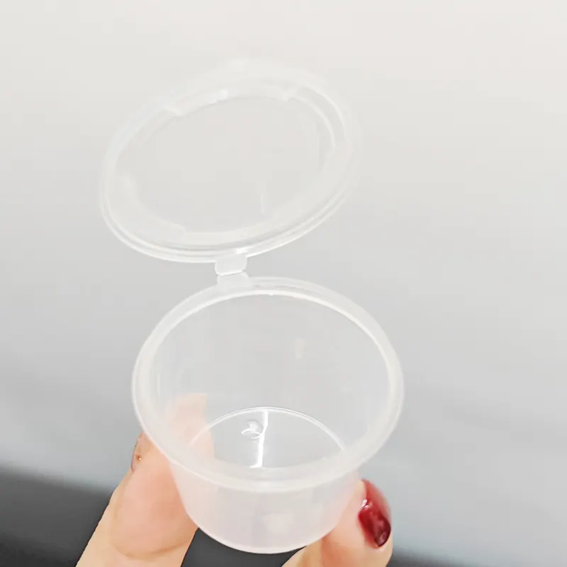 MUESTRA GRATIS 1 2 OZ 2,5 3 4 OZ OEM/ODM Porción de plástico transparente desechable PP Souffle Cup Tazas de salsa resistentes a fugas con tapas