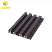 Gmart Foshan Panneaux muraux en bois pour plafond cannelé Panneaux muraux décoratifs en PVC Panneaux de revêtement extérieur en bois composite