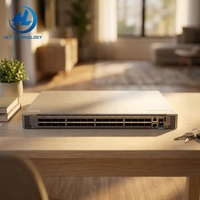 Switches Empresariales FX5200-32C-AFI2, 32 Puertos QSFP+/QSFP28, Ventiladores Redundantes, 2 Fuentes de Alimentación CA, Flujo de Aire de Trasera a Delantera
