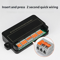Télécommande sans fil étanche industrielle 4CHs 1 récepteur 4 boutons Code d'apprentissage universel pour l'automatisation de la grue 200m