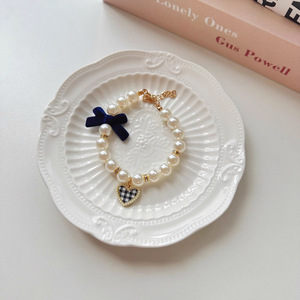Cute <b>bow</b> cat-specific pearl necklace, pet dog collar, puppy and kitten neck brace decoration - Product Image 1
