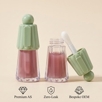 Tubes et couvercles de gloss vert foncé, conteneur de gloss vert menthe, tube de gloss vide pour enfant en forme d'ombrelle irrégulière unique
