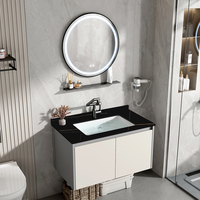 Meuble-lavabo mural pour projet hôtelier, en aluminium étanche, avec vasque en pierre frittée, miroir LED rond et étagère