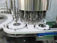 Machine de remplissage automatique haute performance pour liquides, avec suivi des flacons et bouteilles en plastique
