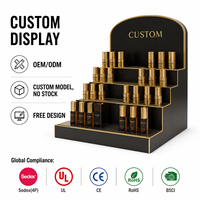 Support d'affichage cosmétique en acrylique personnalisé à 3 niveaux pour flacon de parfum avec emballage plat et éclairage sur mesure