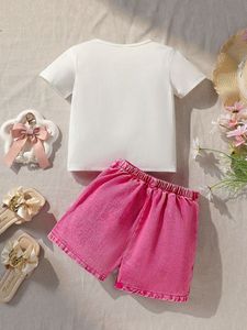 Großhandel Kleinkind Mädchen Kleidungsset Kurzarm Seiden-Schleife Bedrucktes T-Shirt + Jeansrock 2-teiliges Outfit Kleidungsset - Product Image 2