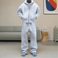 Ensemble de survêtement ample pour homme en molleton épais, personnalisable avec logo, comprenant un sweat à capuche zippé et un pantalon de survêtement en coton French Terry