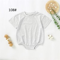 Prêt à expédier 100% coton bio été nouveau-né infantile enfant en bas âge sexe neutre solide coton à manches courtes bébé body barboteuse