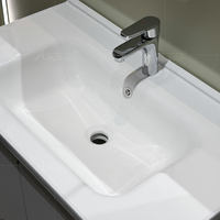 Meuble-lavabo de salle de bain en acier inoxydable sur mesure avec miroir LED et vasque, idéal pour la maison ou l'hôtel