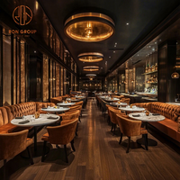 Ensemble de meubles sur mesure pour hôtel et restaurant Ron Group : table ronde en marbre, banquette en velours, chaise rembourrée