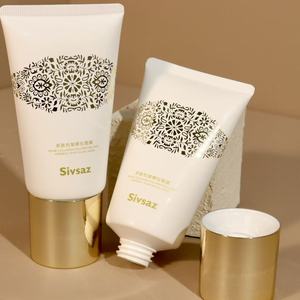 Tube cosmétique blanc avec capuchon électro-plaqué or métallisé pour masque facial peel-off - Product Image 1