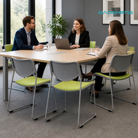Chaise de réunion empilable verte pour un environnement d'apprentissage confortable, avec structure métallique, sièges de formation connectables pour bureau et salle de classe