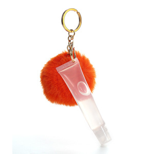 Vendita calda Clear Lip Oil Gloss simpatici bambini idratante lucidalabbra con Macaron Puff Ball Keychain Makeup - Product Image 5