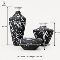 Vase à fleurs en céramique artisanale Jossin, surface noire mate avec un design unique à éclaboussures blanches, pour accessoires de décoration intérieure