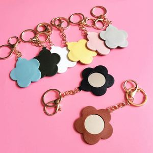 Wholesale <b>Compact</b> <b>Mirror</b> With Keychain Private Label Cute Heart Shape Mini Hand <b>Mirrors</b> Keychain for Girls - Product Image 1