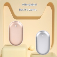 2026 Chauffe-mains électrique USB transfrontalier avec batterie intégrée, modèle galet mignon, sans eau, 1200/3000mAh, pour femme, hiver