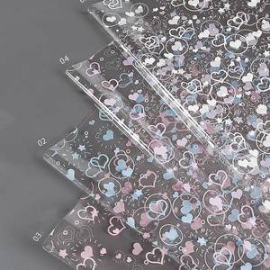 Nouveau 2024 – Lot de 20 feuilles/sac de papier d'emballage pour bouquets en plastique OPP imperméable, motif cœurs colorés, pour fleuristes - Product Image 3