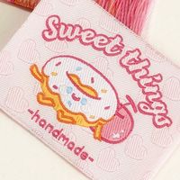 Prix d'usine, certifié OEKO-TEX, écologique, doux pour la peau, polyester, découpe ultrasonique, enroulé, plié, étiquette personnalisée à motif anime