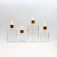 Flacon compte-gouttes rond en verre givré noir mat de haute qualité 15ml/30ml/50ml/100ml pour sérum de soin de la peau avec impression sérigraphique