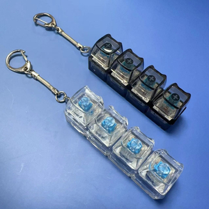 พวงกุญแจรูปหัวหมีน่ารักแบบขายส่ง DIY คลายเครียด คลิกเกอร์คีย์บอร์ด ไฟ LED ของขวัญ - Product Image 1