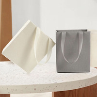 Sac en papier cadeau de luxe personnalisé à motif litchi avec poignée en ruban