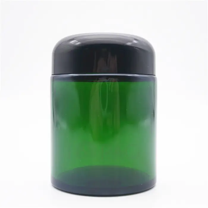 eco friendly tall round green colored glass jars with lids for cream 100ml