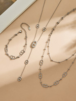 Ensemble collier et bracelet tendance Hip Hop en acier inoxydable plaqué or, serti de zircons, avec fermoir nez de pug